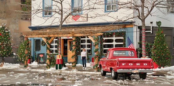 candace cameron bure in front of diner with red truck