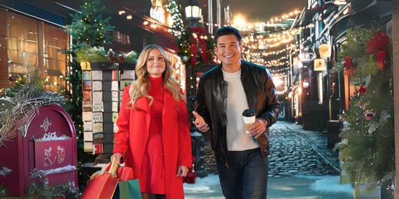 mario lopez and candace cameron bure at christmas festival